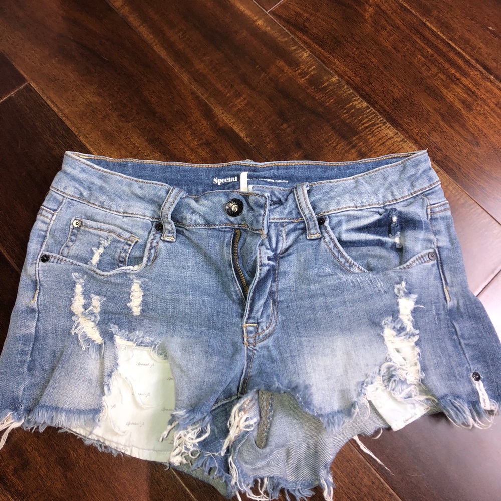 “Special” Ripped Light Wash Jean Shorts